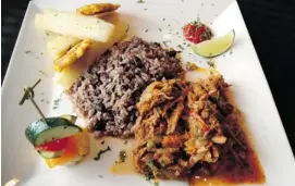  ?? PETER HUM/OTTAWA CITIZEN ?? Ropa vieja — that classic Cuban combinatio­n of braised, shredded beef, mixed with onions and peppers in a piquant, olive-studded tomato sauce — is a favourite at Havana Cafe.