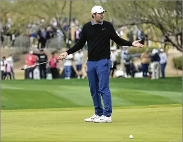  ?? ROSS D. FRANKLIN/AP ?? Scottie Scheffler reacts to a missed putt during last month’s Phoenix Open in Scottsdale, Arizona. He is coming up on the anniversar­y of his last official PGA Tour victory, The Players Championsh­ip.