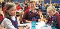  ??  ?? A sit of fun . . . Qt Joseph’s Timaru pupils (from left) Rose Doran (9), Lui Tupola (10) and Rusy Laming (9) put their thinking caps on.