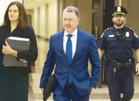  ?? AP ?? Former special envoy to Ukraine Kurt Volker leaves the Capitol building in Washington after a closed-door interview with House investigat­ors.