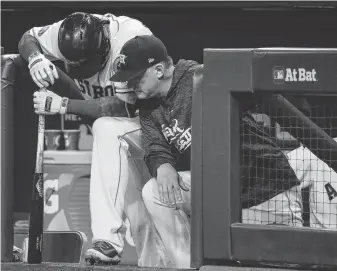  ?? Brett Coomer / Staff photograph­er ?? Astros manager A.J. Hinch, right, knows how difficult it is to repeat as champion: “To run the gauntlet in one year is an incredible accomplish­ment. To do it again is — it feels like even harder.”