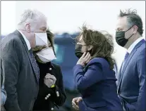  ?? JACQUELYN MARTIN — THE ASSOCIATED PRESS ?? Vice President Kamala Harris and her husband, Doug Emhoff, are greeted by Nevada Gov. Steve Sisolak and his wife Kathy, Monday as they arrive in Las Vegas.