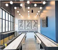  ?? [PHOTOS BY DAVE CATHEY/THE OKLAHOMAN] ?? Shuffle board tables make sticking around the Banquet Cinema Pub more inviting.