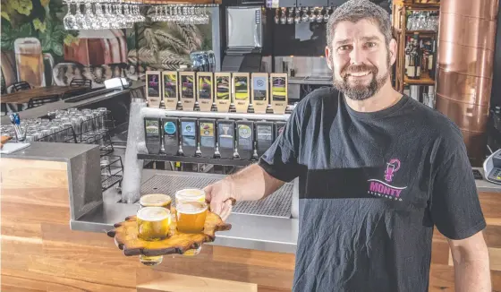  ?? Picture: Nev Madsen ?? POURING TRADE: Nathan Semmens, owner and brewer for Monty Brewing, is ready for the his venue’s official opening today.