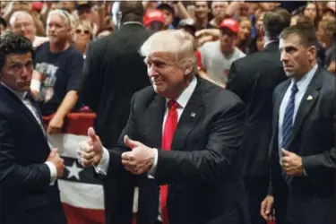  ?? EVAN VUCCI — THE ASSOCIATED PRESS FILE ?? In this file photo, Republican presidenti­al candidate Donald Trump gives a thumbs up as he leaves a campaign rally in Altoona, Pa. While Donald Trump’s chief economic pitch is decrying foreign trade, the audience for his argument is shrinking by the...