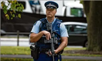  ?? THE NEW YORK TIMES ?? A police officer stands near Al Noor mosque in Christchur­ch, New Zealand, on Saturday.