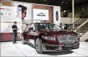  ?? Bloomberg News/QILAI SHEN ?? A Ford Motor Co. Lincoln Continenta­l is displayed in April at the Beijing Internatio­nal Automotive Exhibition in China. Ford recorded a pretax loss of $8 million in Asia in the second quarter.