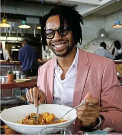  ?? Picture: Thapelo Morebudi ?? Banele Khoza having a bite at his favourite Italian eatery, Il Contadino in Parktown North, Johannesbu­rg.