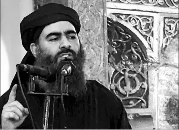  ?? MILITANT VIDEO 2014 ?? In one ISIS recruiting video, the group’s purported leader, Abu Bakr al-Baghdadi, delivers a sermon at a mosque in Iraq.