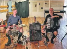  ?? ?? Andrew MacPherson, left, and Stuart Cameron of Deoch ’n’ Dorus in the Tall Ship Glenlee – hear them there this month.