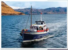  ??  ?? SPLENDID ISOLATION: The stunning scenery at Knoydart, main picture. Above: A ferry chugs across the glorious Loch Nevis