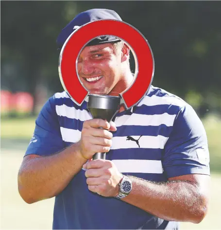  ?? GREGORY SHAMUS/GETTY IMAGES ?? Bryson Dechambeau celebrates winning the Rocket Mortgage Classic on Sunday at the Detroit Golf Club.