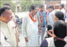  ?? HT FILE HT PHOTO ?? ■ BJP candidate Bharat Bhushan Gupta interactin­g with locals.