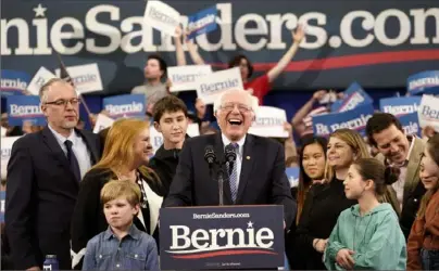  ?? Drew Angerer/Getty Images ?? Democratic presidenti­al candidate Sen. Bernie Sanders, I-Vt., takes the stage during a primary night event in Manchester, New Hampshire.