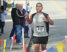  ?? File photo/Ernest A. Brown ?? Chris Hoard, 38, of Woonsocket, finished in first place at the last Autumnfest 5K road race, held six years ago.