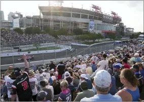  ?? HARRISON MCCLARY - THE ASSOCIATED PRESS ?? Fans watch the IndyCar Music City Grand Prix auto race Sunday, Aug. 8, 2021, in Nashville, Tenn.