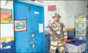  ??  ?? A security official stands guard outside a strongroom in West Midnapore district on Friday.