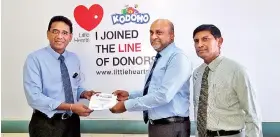  ??  ?? UTN Trading Company (Pvt.) Ltd Managing Director Udaya Nissanka handing over the contributi­on of Kodomo sponsorshi­p to Consultant Pediatric Cardiologi­st Dr. Duminda Samarasing­he who represents the Cardiology Team at the Lady Ridgeway Hospital. Kodomo...