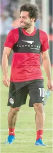  ?? — AFP ?? Egypt’s Mohamed Salah greets fans during the final training session at Cairo Internatio­nal Stadium in Cairo on Saturday.