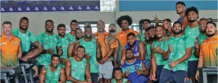  ?? Photo: Fijian Drua ?? Swire Shipping Fijian Drua players with former Australian Wallabies great Lote Tuqiri and Radike Samo (both standing in the middle) at the Drua homebase in Legalega, Nadi, on May 29, 2023.