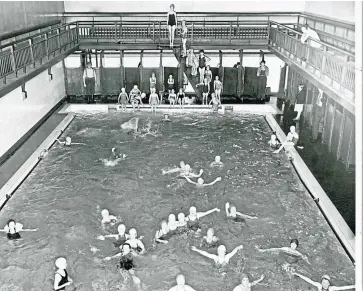  ??  ?? Enjoying a dip in Lochee Baths in 1956.