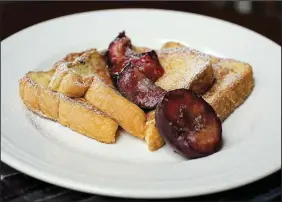  ?? Food styling/ KELLY BRANT Arkansas Democrat- Gazette/ THOMAS METTHE ?? Cinnamon- Roasted Plums With French Toast