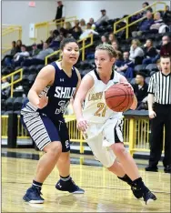  ?? PHOTO BY SHELLEY WILLIAMS ?? Prairie Grove’s Taylor Hartin drives the baseline during a 67-42 win against Shiloh Christian during her senior season. Taylor and her twin sister, Mattie Hartin, have both been selected as female Athlete of the Year at Prairie Grove for 2016 by the...