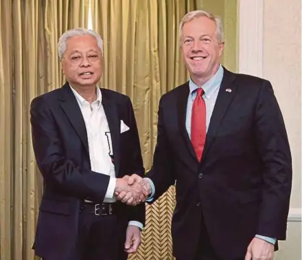  ?? BERNAMA PIC ?? Prime Minister Datuk Seri Ismail Sabri Yaakob meeting ambassador Ted Osius, president and chief executive officer of the US-ABC, in Washington, the United States, on Wednesday.