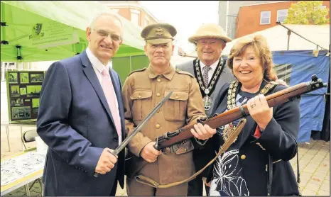  ??  ?? Local historian and Vice Chairman of Hinckley &amp; District Museum Greg Drozdz (left) and Mayor of Hinckley and Bosworth, Jan Kirby with consort Mike Kirby, meeting WW1 actor at the Heritage Open Day pop up exhibition in Market Place, Hinckley. Picture: Jim Tomlinson, courtesy of Hinckley and Bosworth Borough Council.