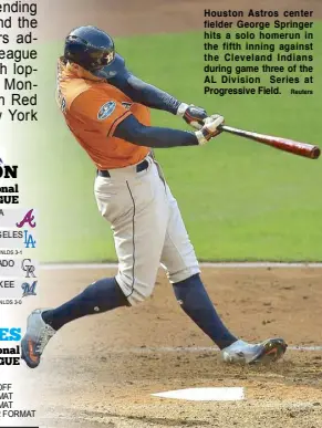  ?? Reuters ?? Houston Astros center fielder George Springer hits a solo homerun in the fifth inning against the Cleveland Indians during game three of the AL Division Series at Progressiv­e Field.