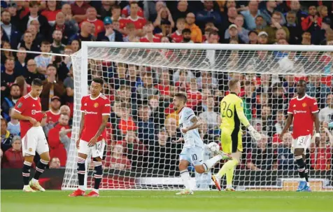  ?? — Reuters ?? (Top) West Ham United’s Manuel Lanzini celebrates scoring against Manchester United.