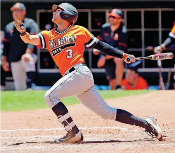  ??  ?? [PHOTO BY NATE BILLINGS, THE OKLAHOMAN] Garrett McCain and the Cowboys are looking up after making a run into the NCAA Tournament, with a trip to the Fayettevil­le Regional next.