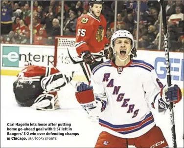  ?? USA TODAY SPORTS ?? Carl Hagelin lets loose after putting home go-ahead goal with 5:57 left in Rangers’ 3-2 win over defending champs in Chicago.