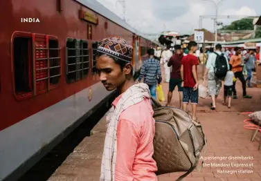  ?? ?? A passenger disembarks the Mandovi Express at
Ratnagiri station