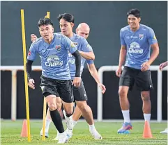  ?? ?? Thailand players take part in a training session in Dubai yesterday.