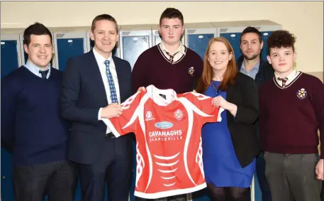  ??  ?? Sean Herlihy and James Foley of Cavanagh’s Charlevill­e presenting a set of jerseys to Luke Barry, captain of the C.B.S. Rugby team, and Una Griffin, school Principal, with teacher/team coach Paul Cronin and Frankie Barrington, team vice-captain.