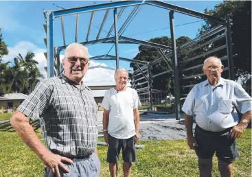  ?? Picture: STEWART McLEAN ?? MOVING FAST: Gordonvale Men's Shed president Jeff Hall, secretary Peter Noonan and member Don Dunne in front of the frame work of the group’s new shed.