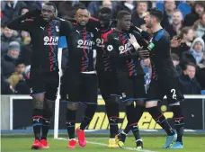  ?? Reuters ?? Crystal Palace attacker Jordan Ayew, second left, celebrates scoring the winning goal at Brighton yesterday