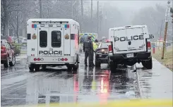  ?? HAMILTON SPECTATOR FILE PHOTO ?? The police scene in front of a townhouse on Caledon Street where SIU are investigat­ing the police shooting of a youth in the townhouse complex in April of this year.Left, police on King Street East for the fatal shooting of Michael Campbell in August.