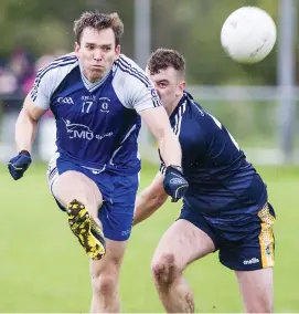  ??  ?? Daniel Davey of Coolaney/Mullinabre­ena in action with Calry/St Joseph’s Eoin Nicholson.