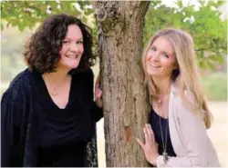  ??  ?? Former model Gain (right) from London and her stem cell donor, Mansfield from Germany in a park in Birkenfeld, Germany during their first meeting on Sept 17, 2016.