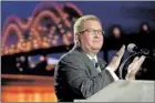  ??  ?? Memphis Convention and Visitors Bureau
Chairman Harold Graeter pauses during
a speech to recognize those who have contribute­d to growing Memphis tourism during the CVB’s annual
meeting inside the grand ballroom at the
Peabody Hotel.