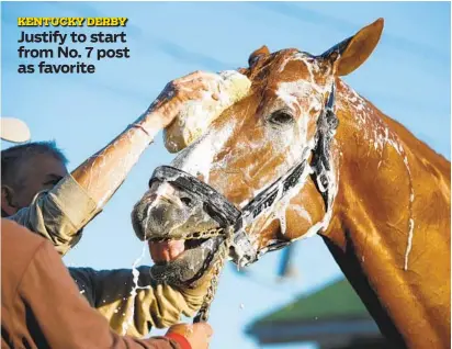  ?? ANDY LYONS/GETTY IMAGES ?? Justify, washed at Churchill Downs, will try to break the “Curse of Apollo” and become the first horse in 136 years to win the Kentucky Derby after not running as a 2-year-old. “If he doesn’t break well, it doesn’t matter what hole he’s in,” trainer...