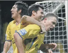  ??  ?? COUNTY DOWNED Ex-Hawks man Tony Taggart, right, has just netted the winner at Notts County in December 2007