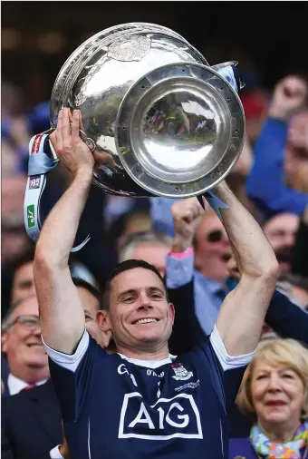  ??  ?? Dublin captain Stephen Cluxton lifts the Sam Maguire Cup.