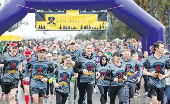  ?? DARREN STONE, TIMES COLONIST ?? More than 500 participan­ts in the Sarah Beckett Memorial Run left from Belmont Secondary School in Langford at 10 a.m. Saturday. Another 400 lent their support by taking part in a “virtual run” held in memory of the West Shore Mountie, who was killed while on duty on April 5, 2016.