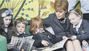  ?? PICTURE: PA ?? 2 Nicola Sturgeon meets pupils at Riverside Primary School in Stirling to announce further expansion of the First Minister’s Reading Challenge