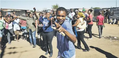  ?? Picture: Jacques Nelles ?? CATAPULT PROTEST. Residents of Soshanguve Block KK during a service delivery protest in Pretoria yesterday, demanding electricit­y and housing.