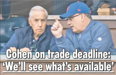  ?? Corey Sipkin ?? OWNING UP: Steve Cohen (right, talking with former Mets owner Fred Wilpon) said he knew he would care about every game after buying the team, but said he’s “living and dying with every inning.”