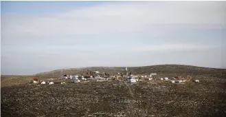  ?? (Ronen Zvulun/Reuters) ?? A GENERAL VIEW shows the Esh Kodesh outpost near Shiloh.